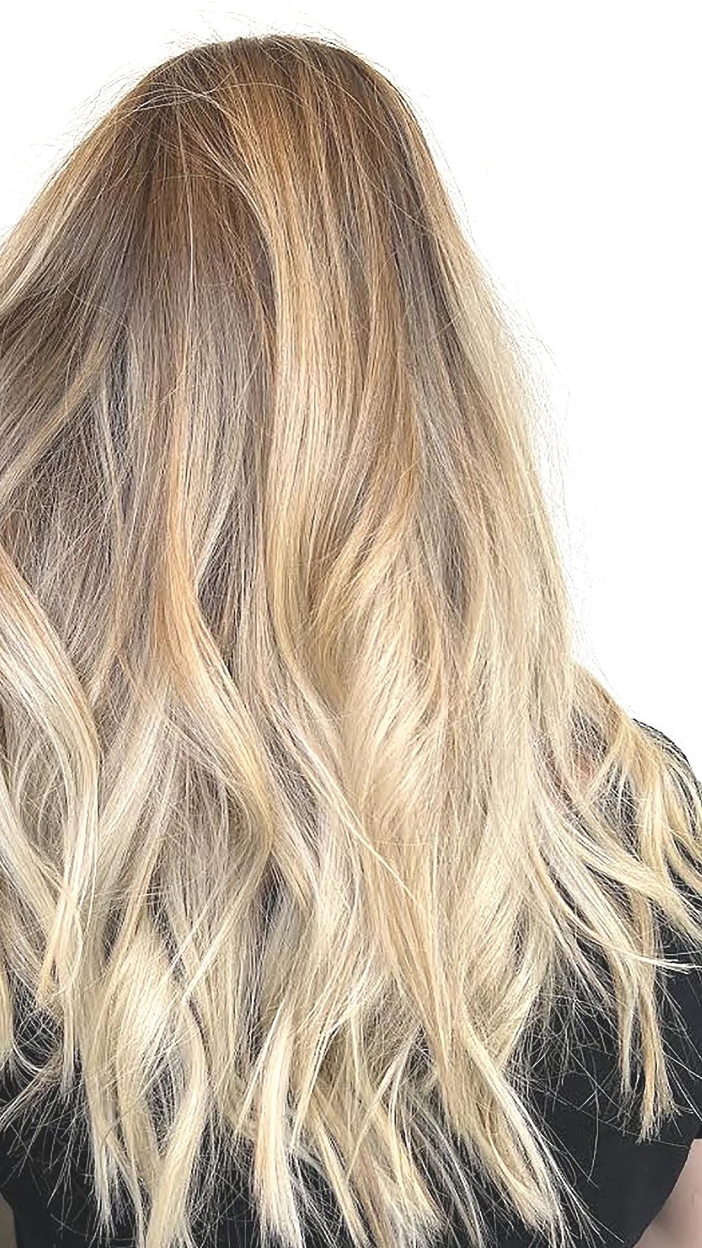 Model with dimensional balayage color, side profile